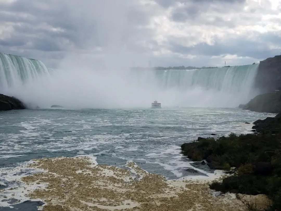 Tour boat at misty Horseshoe Falls, Niagara